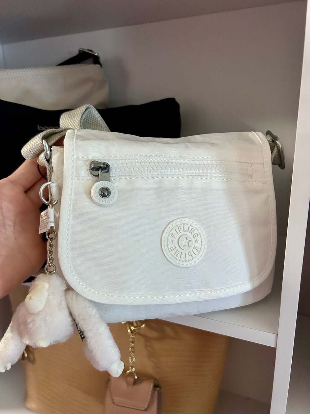 Kipling Sabian Crossbody Mini Bag in White with Monkey Keychain